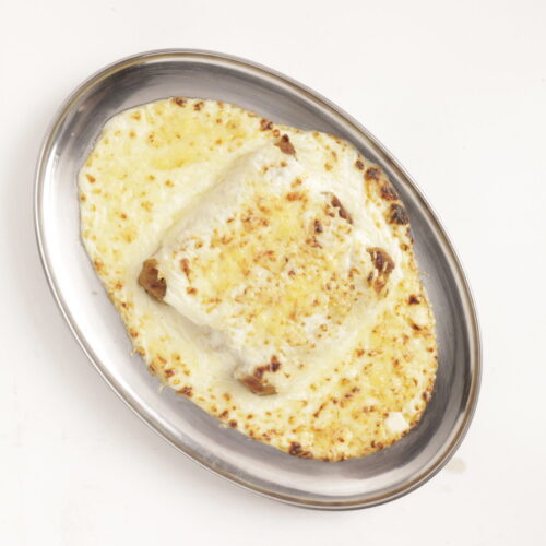 Canelons de rostit amb beixamel i formatge emmental Canelons de rostit amb beixamel i formatge emmental