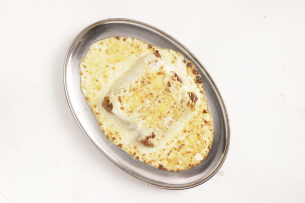 Canelons de rostit amb beixamel i formatge emmental
